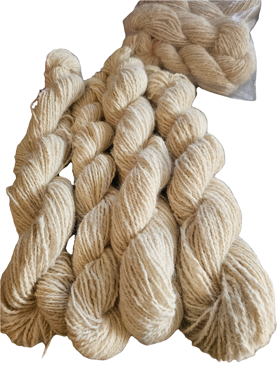 Wool spinning services.  Custom-made traditional hand spun yarn from your sheep's wool or alpaca.