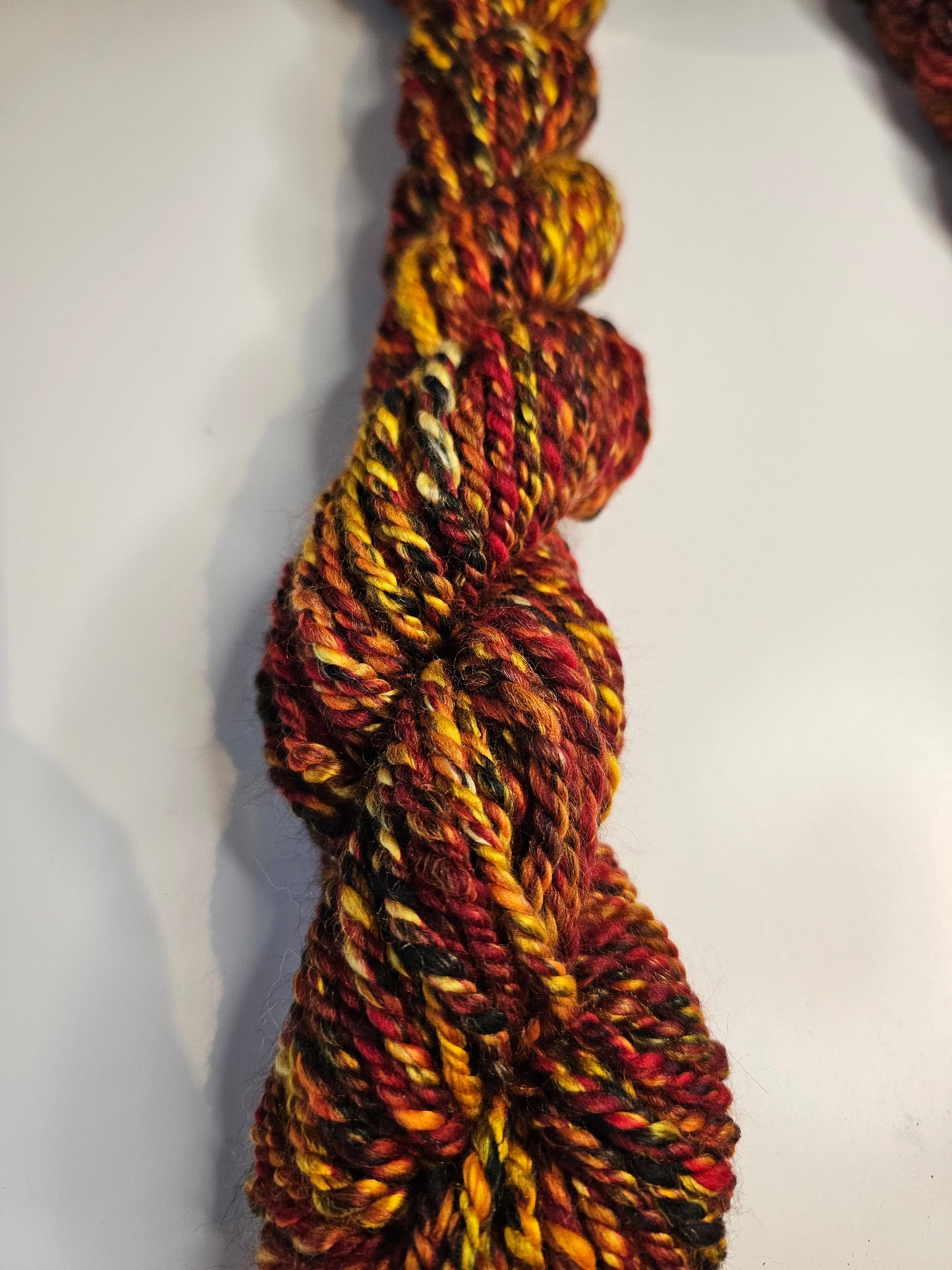 Hand-spun Yarn . Autumn Blaze Aran weight yarn