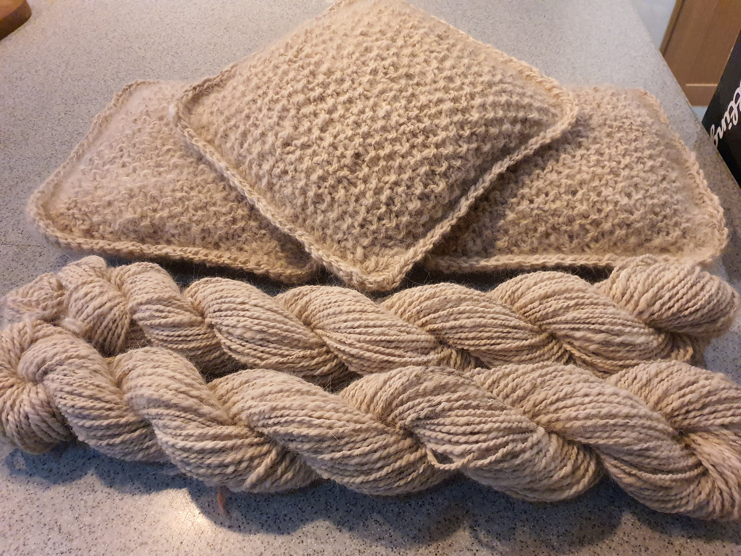 Handmade items made from pet fur yarn.