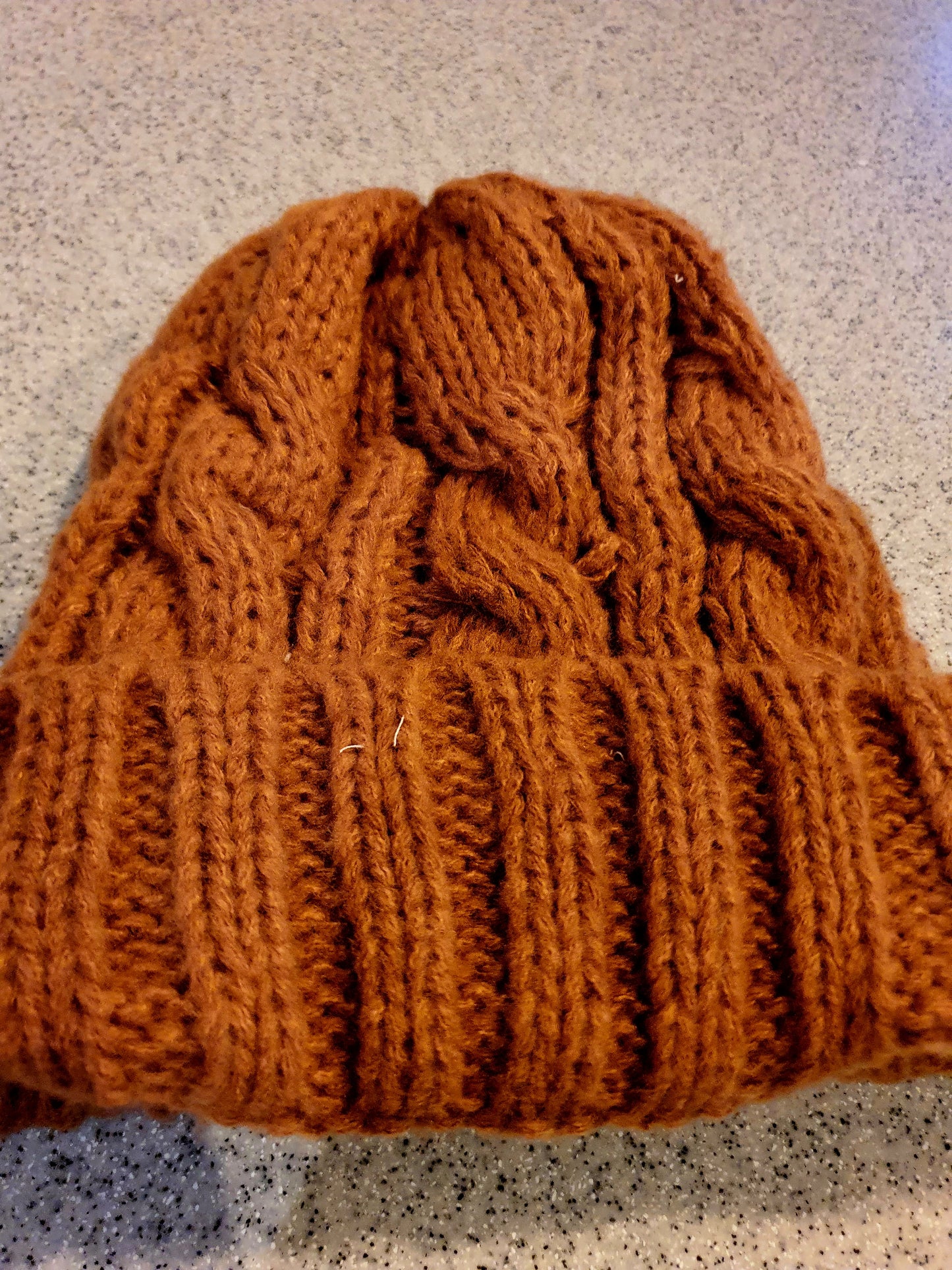 Hand knitted cable hat