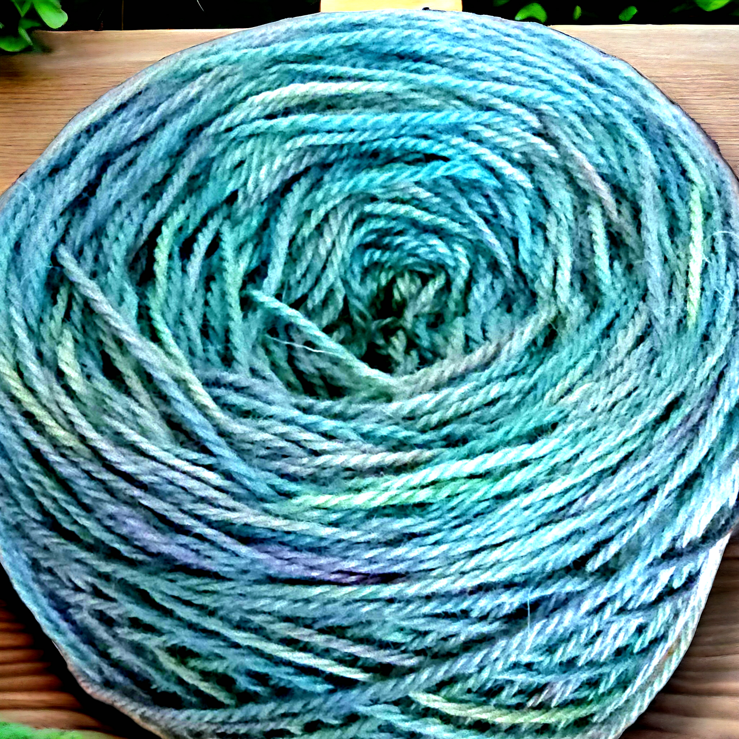 Hand dyed DK yarn in greens and lavender.