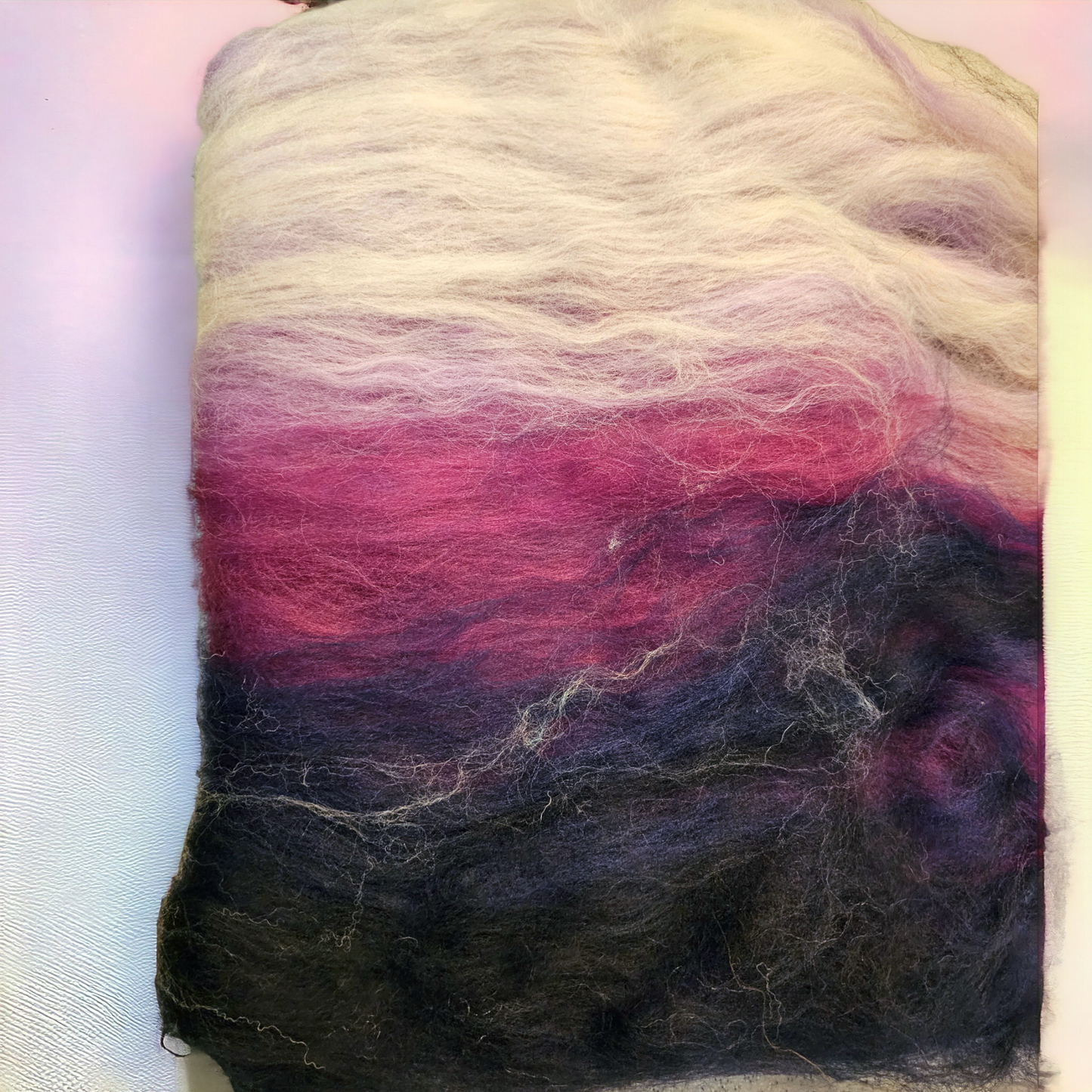 Art yarn wool batt perfect for spinning into yarn, felting or weaving.