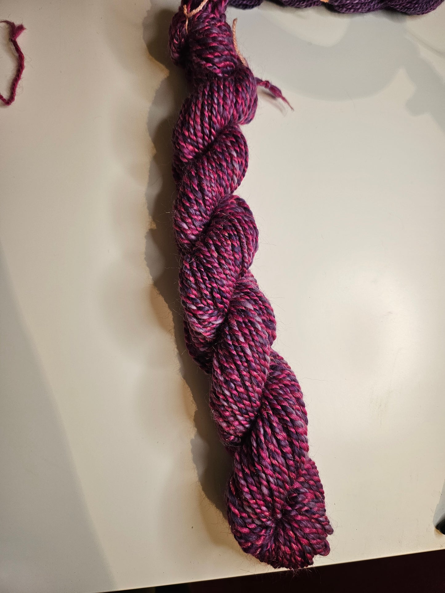 Hand-spun yarn.Purples