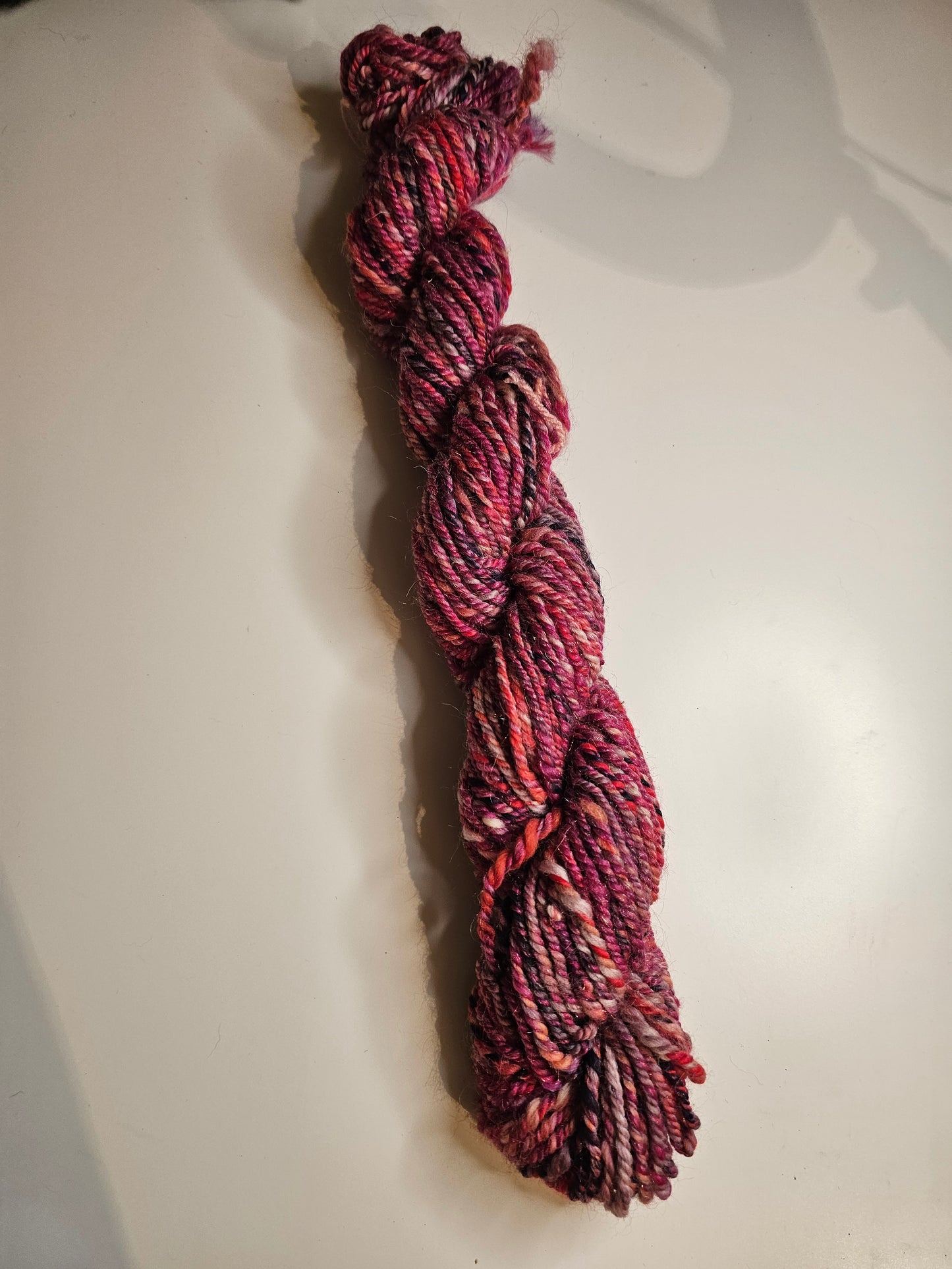 Hand-spun yarn.Purples