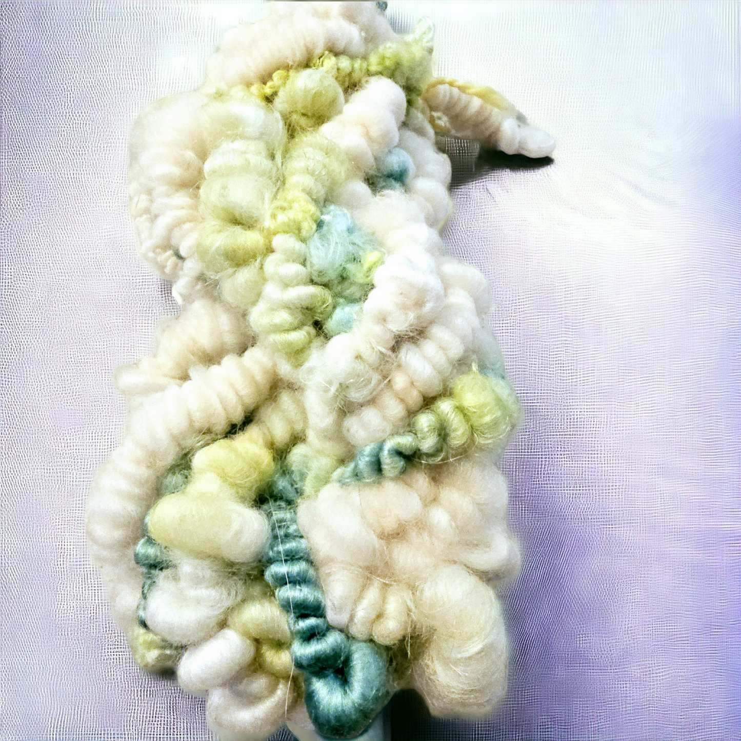 Hand-spun art yarn in Beautiful blues and greens. (Super chunky yarn)