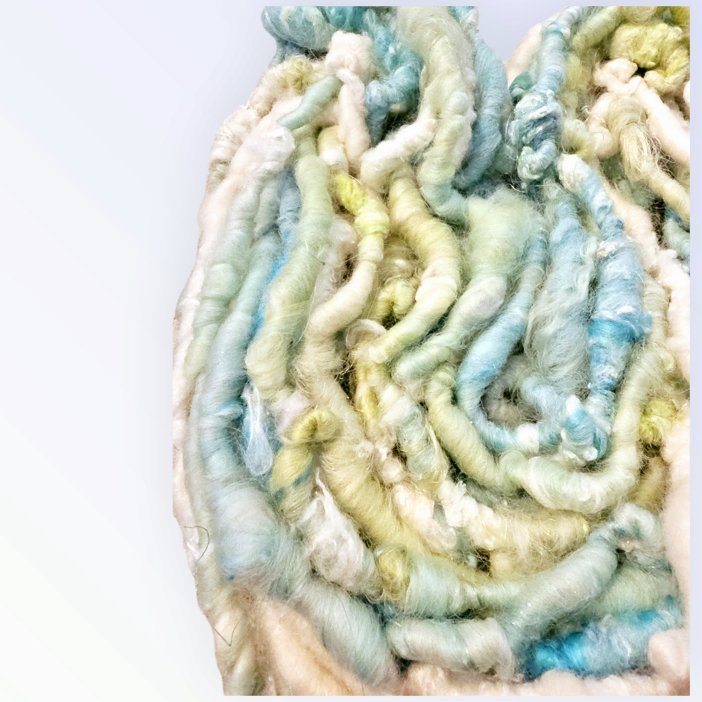 Hand-spun art yarn in Beautiful blues and greens. (Super chunky yarn)