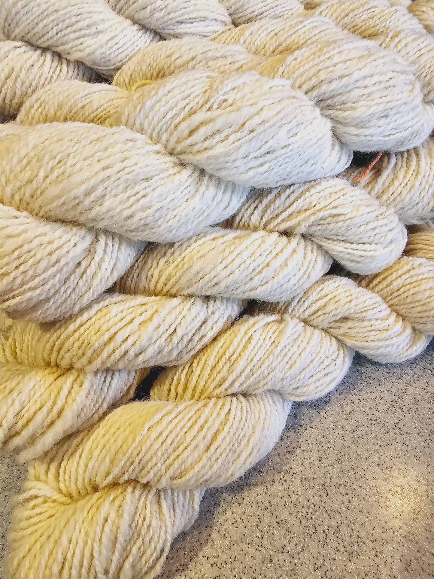Wool spinning services.  Custom-made traditional hand spun yarn from your sheep's wool or alpaca.