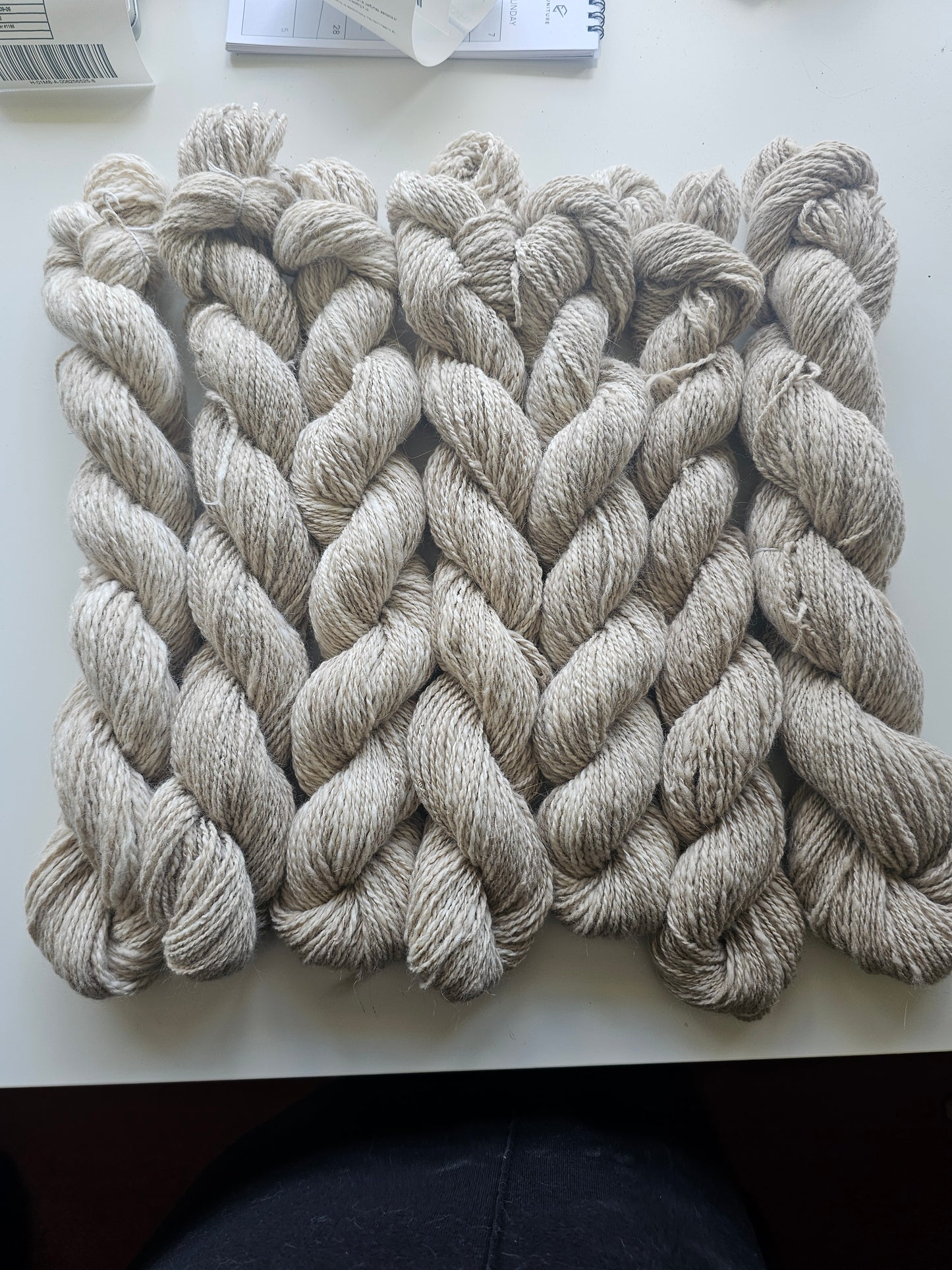 Wool spinning services.  Custom-made traditional hand spun yarn from your sheep's wool or alpaca.