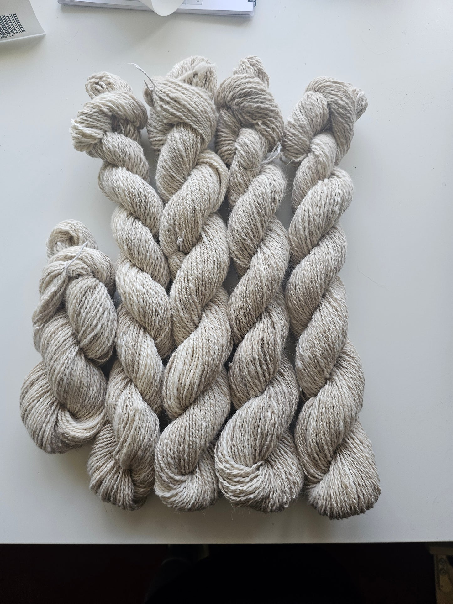 Wool spinning services.  Custom-made traditional hand spun yarn from your sheep's wool or alpaca.