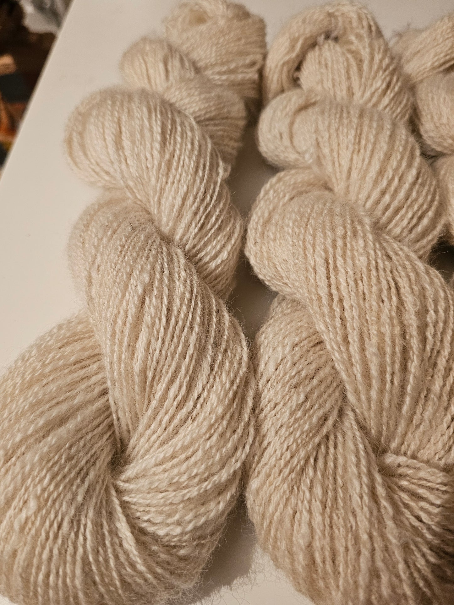 Wool spinning services.  Custom-made traditional hand spun yarn from your sheep's wool or alpaca.