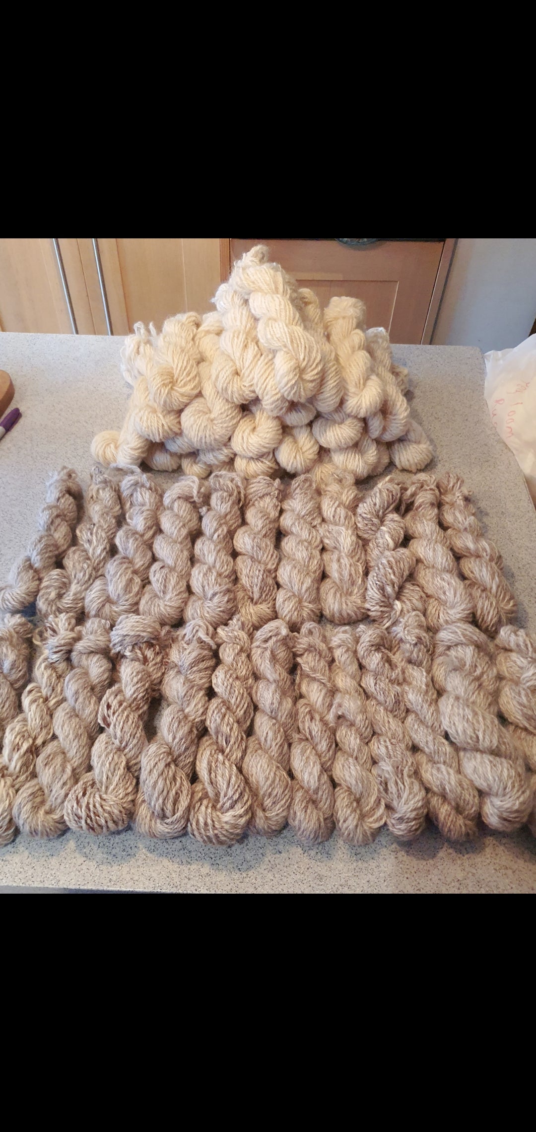 Wool spinning services.  Custom-made traditional hand spun yarn from your sheep's wool or alpaca.