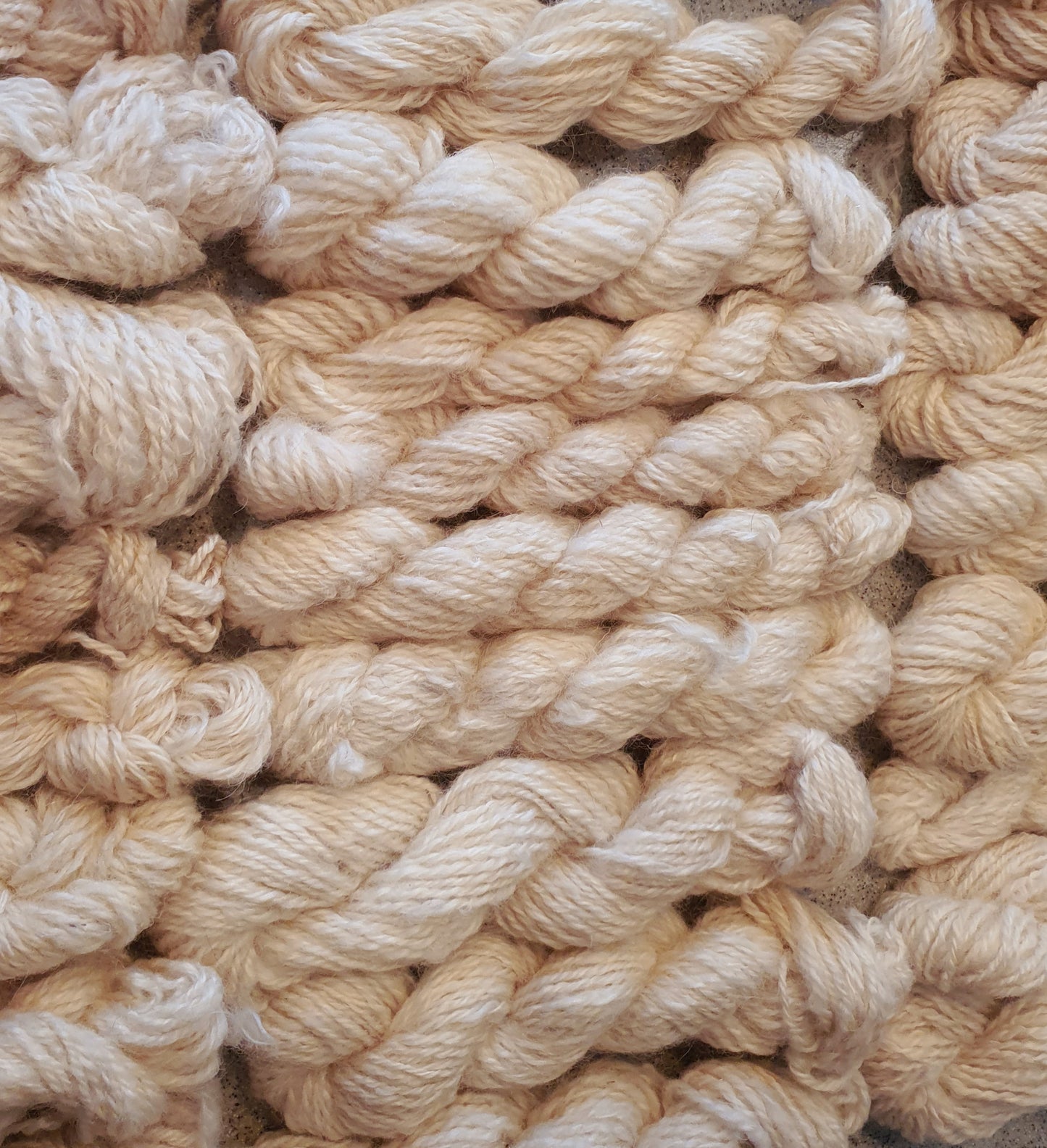 Wool spinning services.  Custom-made traditional hand spun yarn from your sheep's wool or alpaca.