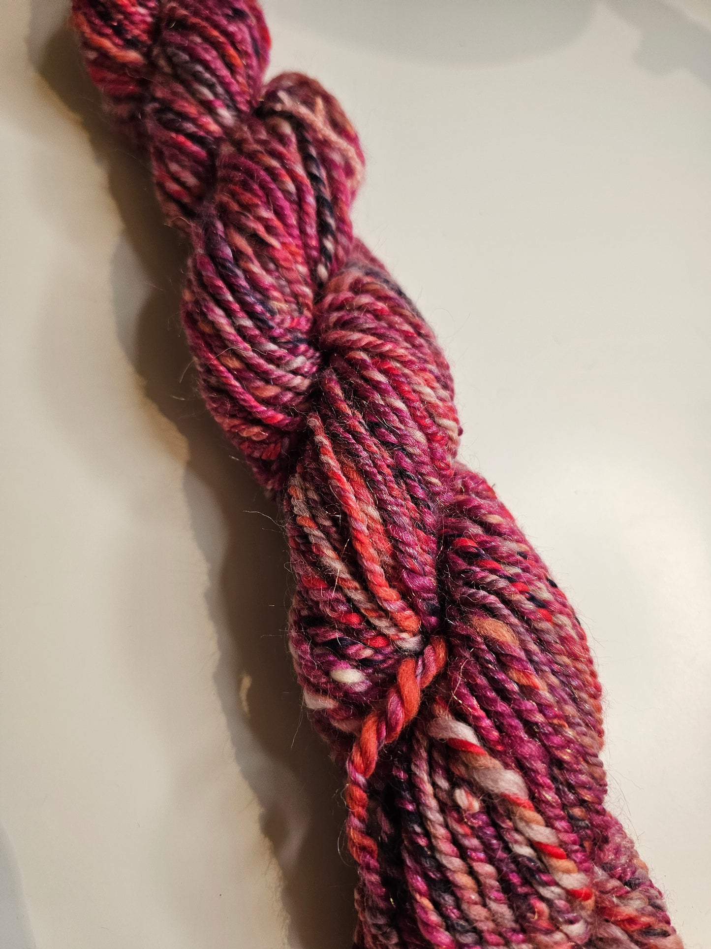 Hand-spun yarn.Purples