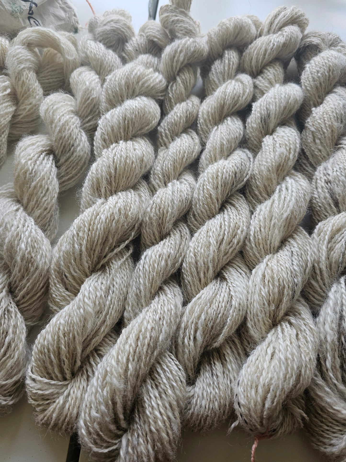 Wool spinning services.  Custom-made traditional hand spun yarn from your sheep's wool or alpaca.