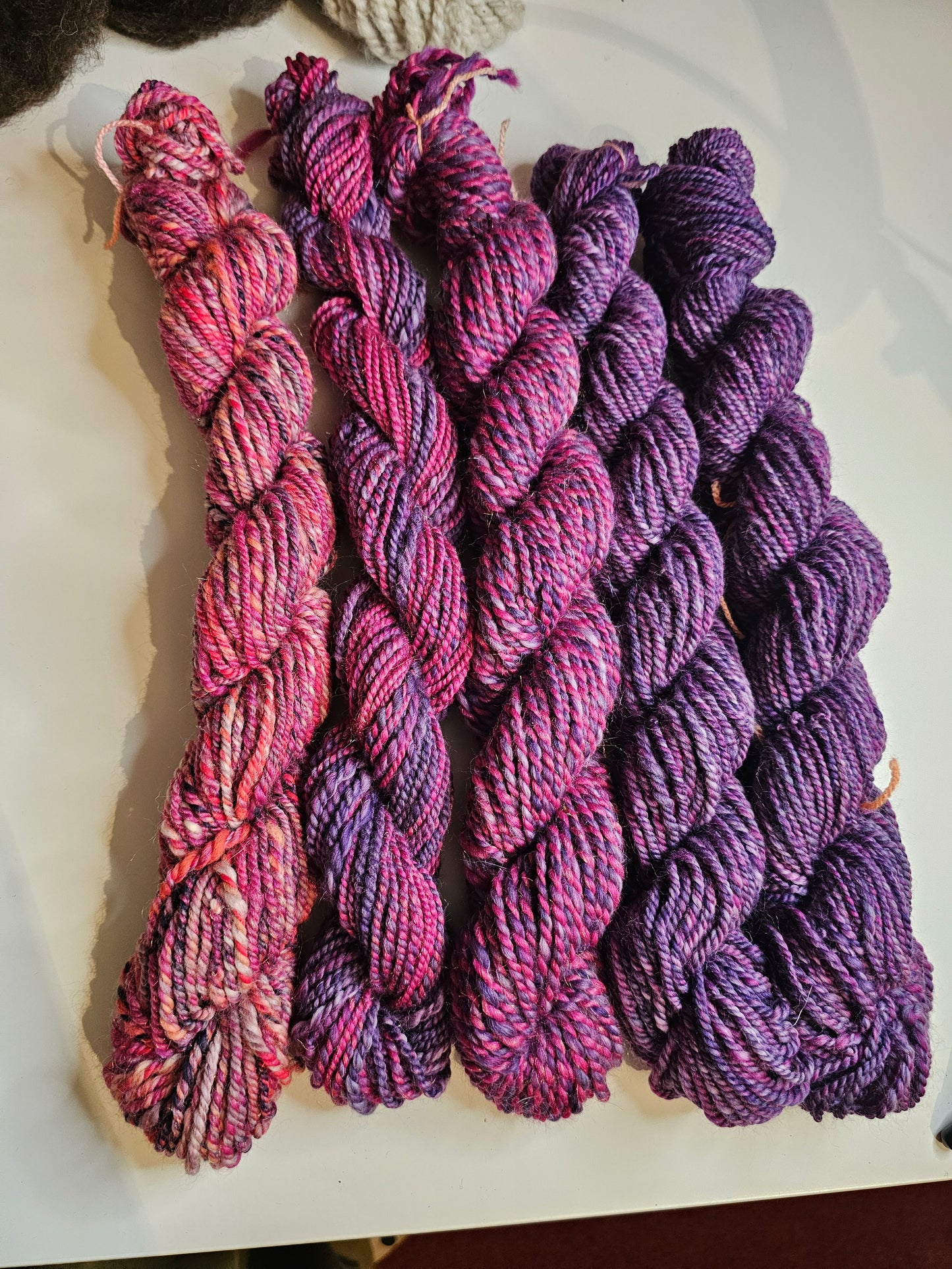 Hand-spun yarn.Purples