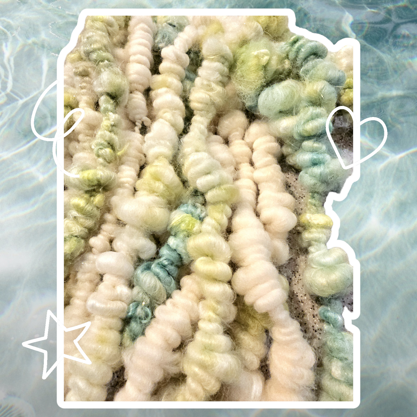 Hand-spun art yarn in Beautiful blues and greens. (Super chunky yarn)