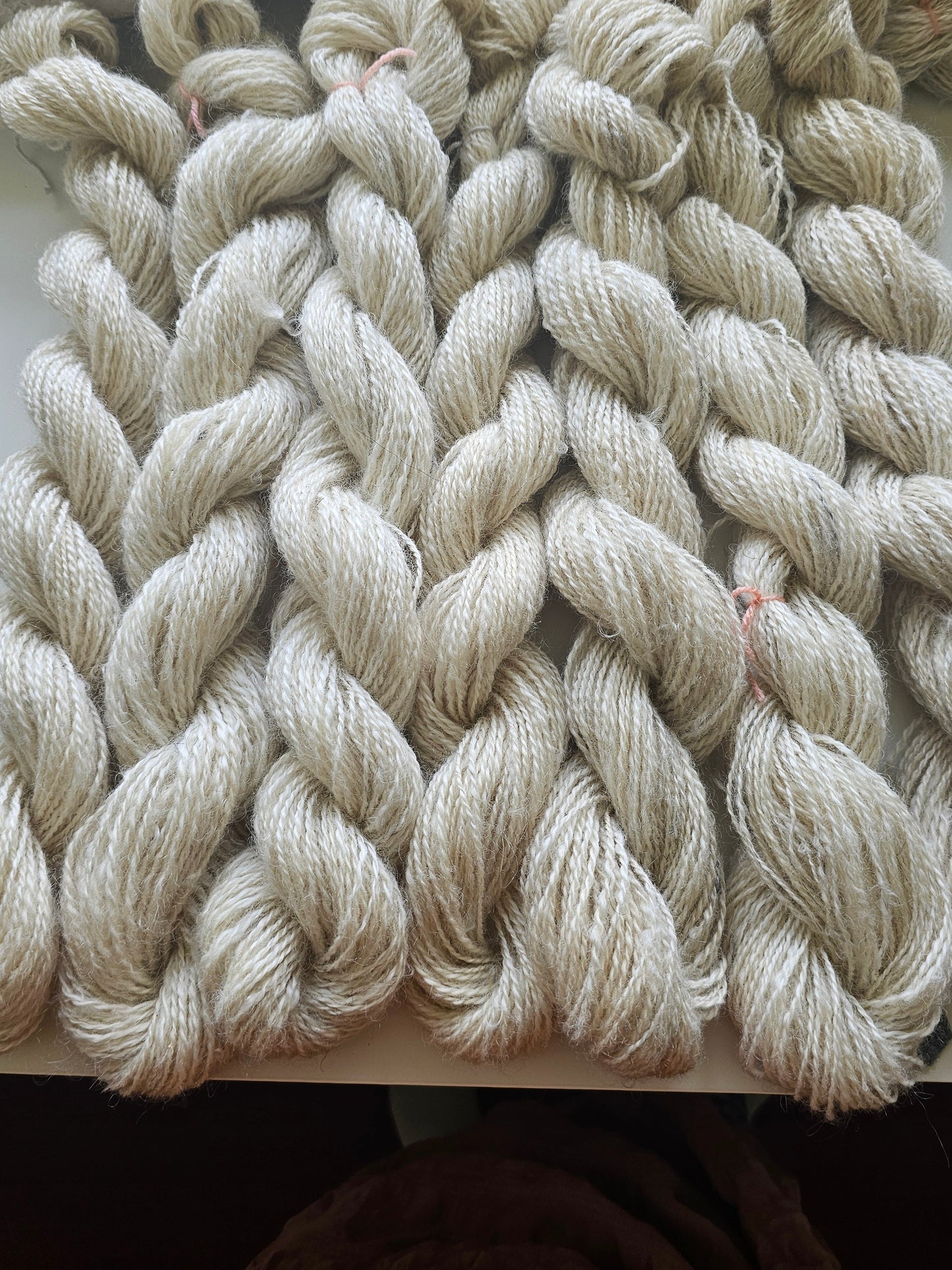 Wool spinning services.  Custom-made traditional hand spun yarn from your sheep's wool or alpaca.