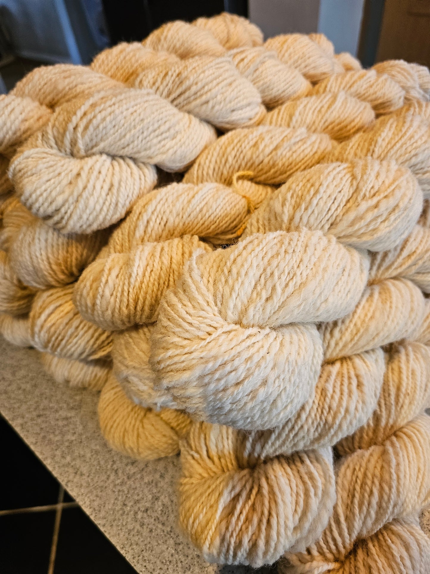 Wool spinning services.  Custom-made traditional hand spun yarn from your sheep's wool or alpaca.