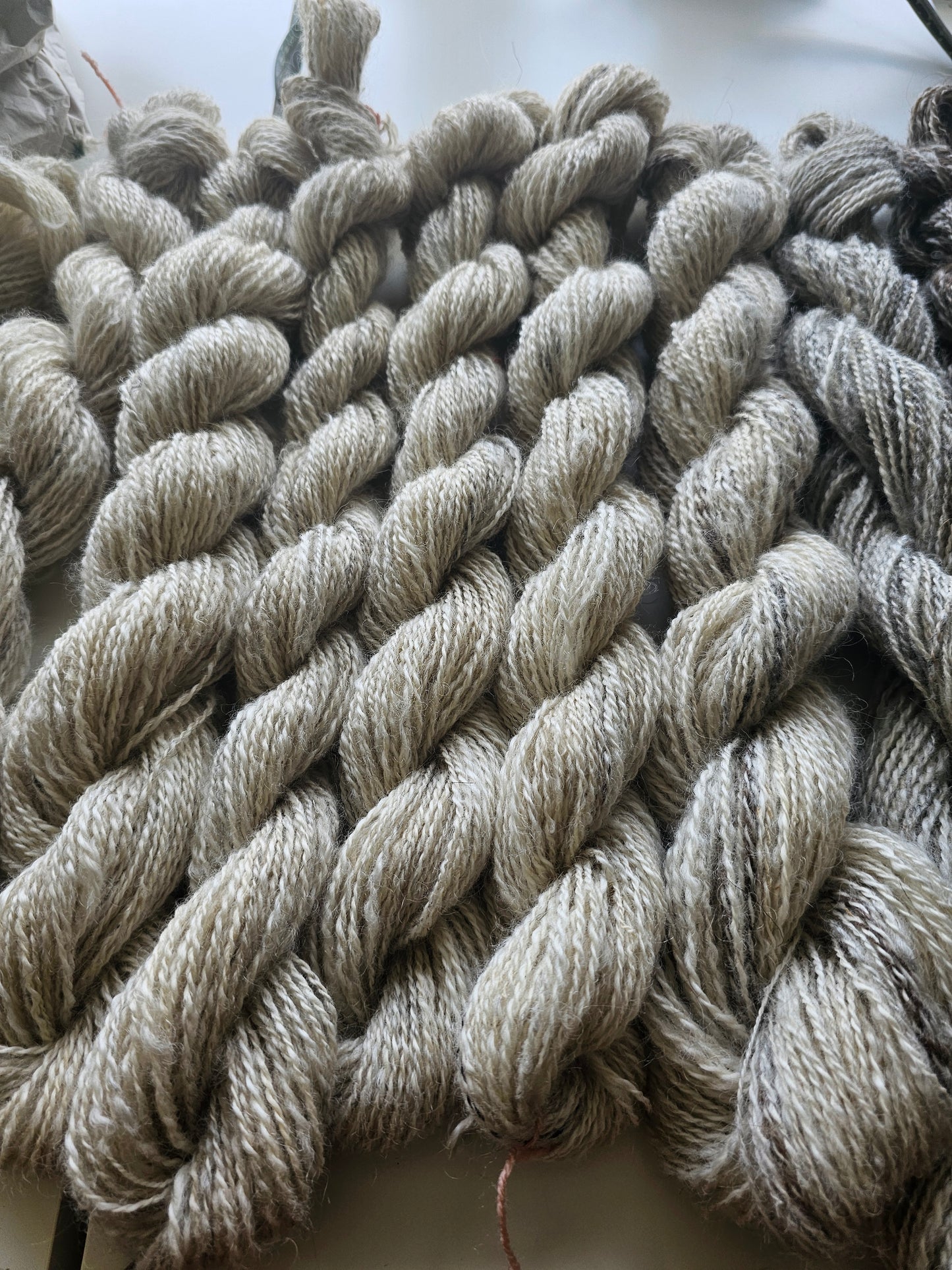 Wool spinning services.  Custom-made traditional hand spun yarn from your sheep's wool or alpaca.