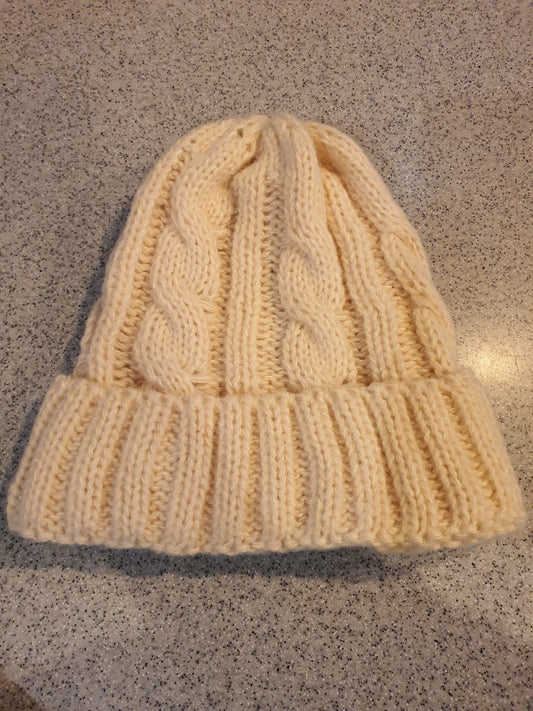 Hand knitted cable hat