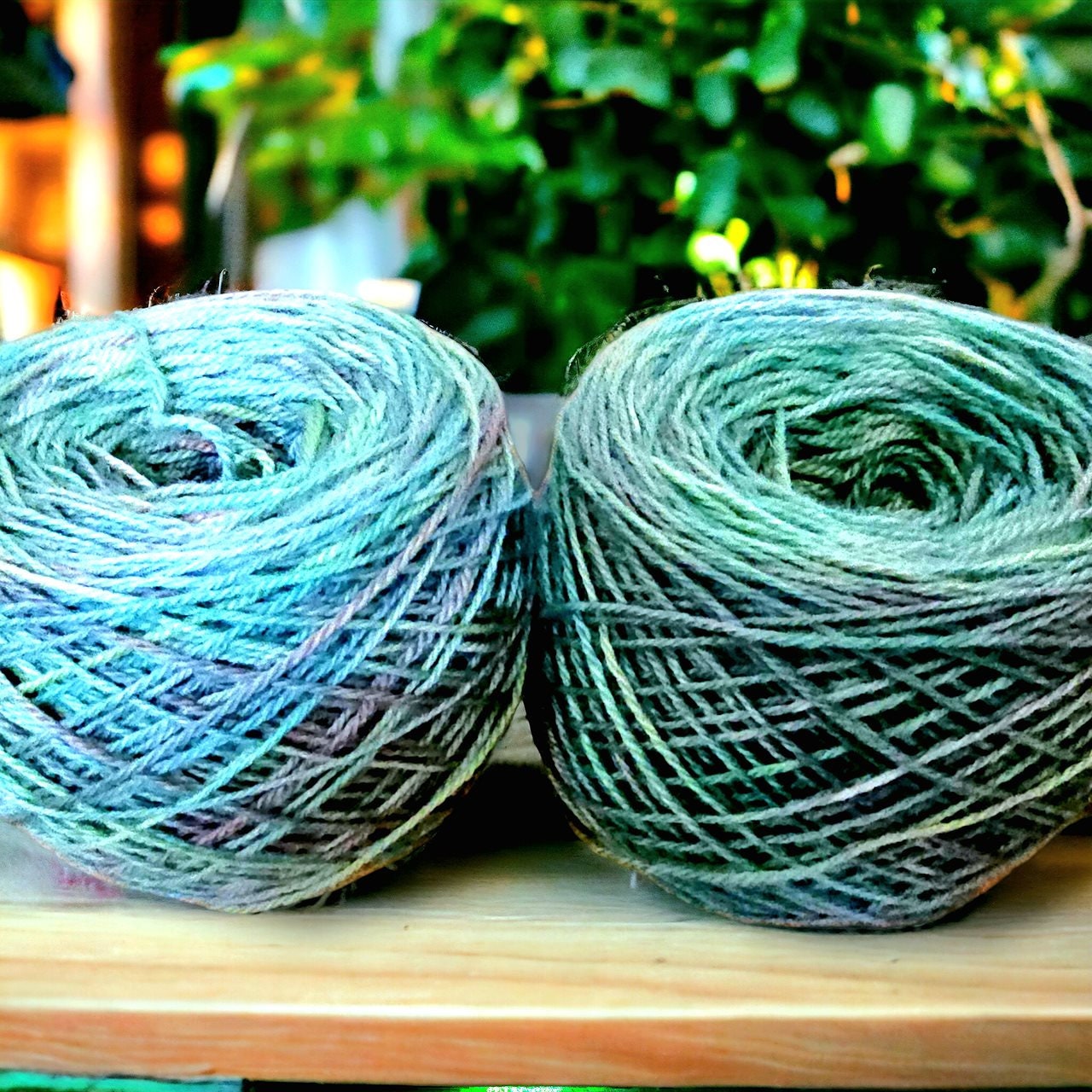 Hand dyed DK yarn in greens and lavender.